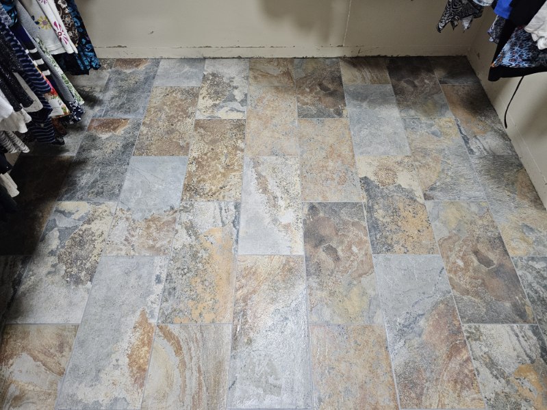 Finished slate tile floor laid wall to wall